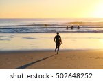 Surfer On The Beach Free Stock Photo - Public Domain Pictures