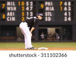 Small photo of DENVER-AUG 21: Colorado Rockies infielder Nolan Arenado stands on second base during a game against the New York Mets at Coors Field on August 21, 2015 in Denver, Colorado.