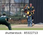 Small photo of PUCHONG, MALAYSIA - SEPT 24: Rakesh Madhavan of Malaysia bats at the Pepsi ICC World Cricket League Div 6 finals against Guernsey at the Kinrara Oval on September 24, 2011 in Puchong, Malaysia.