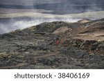 lonely tourist on lava field in ...