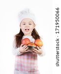 Small photo of A young girl uses fresh apples to make something good to eat.