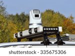 a video camera on the roof of a ...