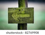 green directional sign in the...