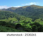 view of sunlit valley from...