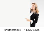 stock-photo-portrait-of-support-phone-operator-in-headset-showing-blank-signboard-with-copyspace-area-for-text-412379236.jpg