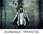 Small photo of A stranger wearing hoodies,Movies or Book cover ideas