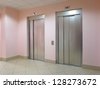 [Obrazek: stock-photo-two-closed-modern-elevators-...273672.jpg]