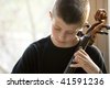 stock photo : Young Boy Playing Cello