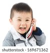 Asian baby boy talk to mobile - stock photo - stock-photo-asian-baby-boy-talk-to-mobile-169671362