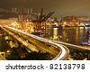 QUELS SONT CES NAVIRES ? - Page 48 Stock-photo-cargo-terminal-and-highway-82138798