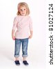 little blonde girl with an angry expression in her pajamas