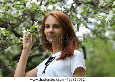 https://thumb9.shutterstock.com/display_pic_with_logo/100037/433917052/stock-photo-beautiful-young-woman-walking-in-park-433917052.jpg