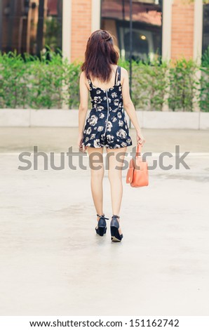 https://thumb9.shutterstock.com/display_pic_with_logo/1008056/151162742/stock-photo-asian-girl-walking-away-in-park-151162742.jpg