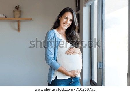 pregnant woman belly Mature