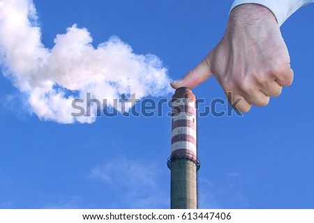 Man with hand making stop to environmental pollution
