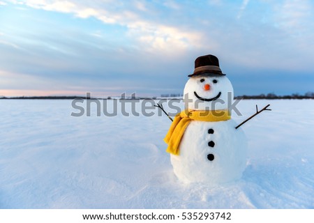 snowman on orange sunset background