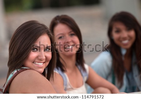 https://thumb9.shutterstock.com/display_pic_with_logo/102804/114791572/stock-photo-group-of-three-asian-and-european-teenage-girls-sitting-114791572.jpg