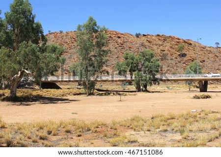 stock-photo-bridge-over-a-dry-todd-river-without-water-alice-springs-australia-467151086.jpg