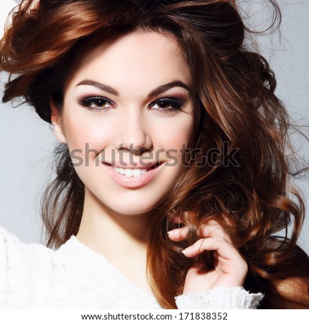 Beauty portrait of beautiful brunette girl in the studio