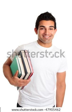 Male university or college student holding a stack of books under one ...