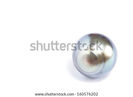 Tahitian black pearl isolated on white background