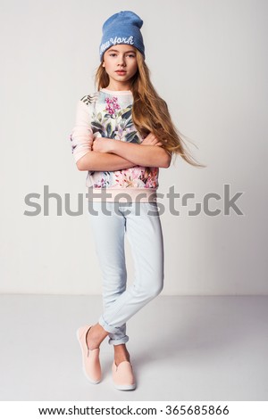 beautiful fashionable kid girl isolated on white