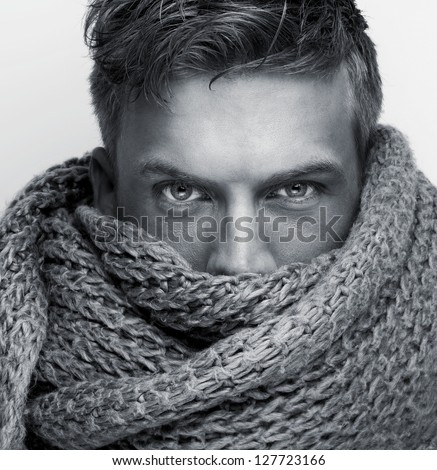 Portrait of a fashion models face covered by scarf - black and white