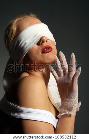 Tied up and blindfolded Tied up and blindfolded