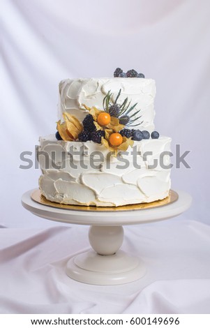 Two Tiered White Cream Cake Decorated With Berries In A Rustic Style Trends For Two Tiered White Cream Cake Decorated With Berries In A Rustic Style Trends For