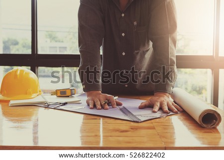 Architect concept, Architects working with blueprints in the office, Vintage Effect