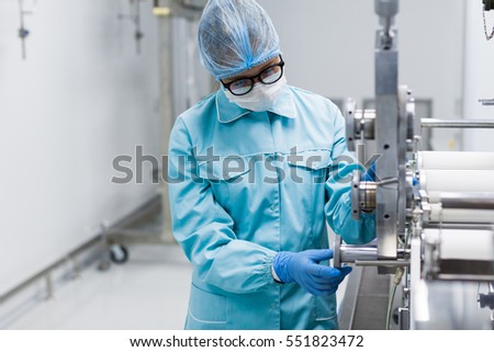 scientist conducting an audit of the company