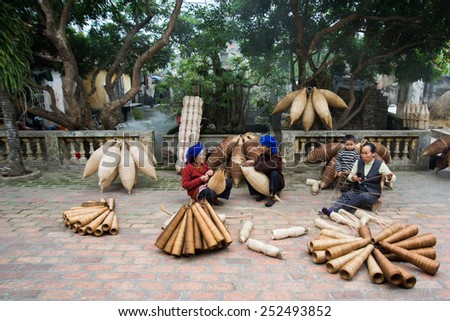 HUNGYEN, VIETNAM - FEB 7 :Unidentified women was weaving bamboo on February 7, 2015 in HungYen, Vietnam. Weaving this tools that used to catch fish is traditional occupation in Hung Yen province.
