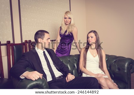 https://thumb9.shutterstock.com/display_pic_with_logo/1286701/246144892/stock-photo-love-story-for-three-love-triangle-where-one-man-with-two-women-love-feeling-jealousy-betrayal-246144892.jpg