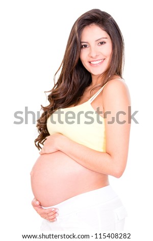 Beautiful pregnant woman - isolated over a white background