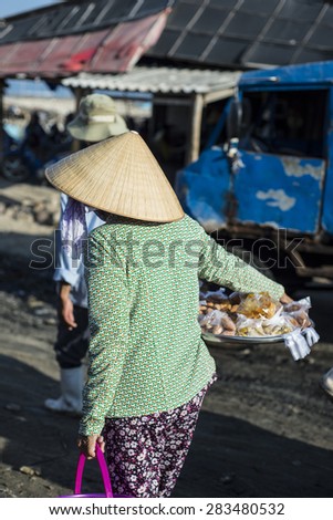 Long Hai, Ba Ria - Vung Tau Province, Vietnam - 31 May 2015: A street vendor in Long Hai, Ba Ria - Vung Tau Province