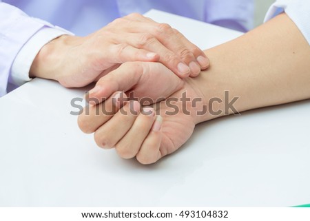 Checking pulse, close up