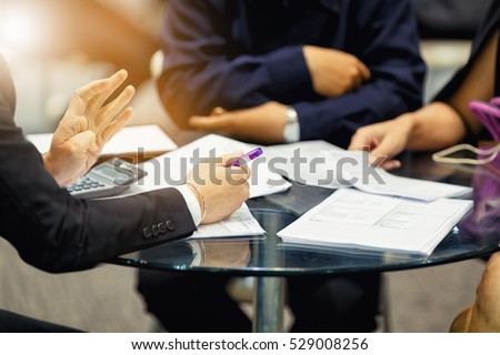 sales manager giving advice to his couple clients