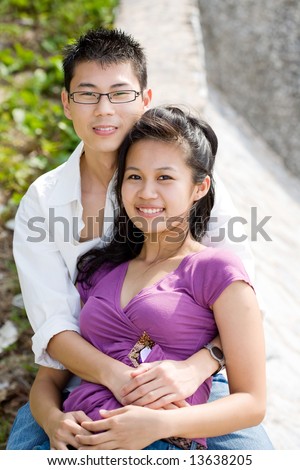 https://thumb9.shutterstock.com/display_pic_with_logo/133396/133396,1213191221,2/stock-photo-happy-asian-couples-with-the-guy-hugging-the-girl-13638205.jpg