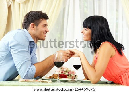 https://thumb9.shutterstock.com/display_pic_with_logo/137002/154469876/stock-photo-beautiful-couple-having-romantic-dinner-at-restaurant-154469876.jpg