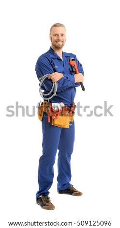 Handsome plumber with pipe wrench and flexible hose isolated on white