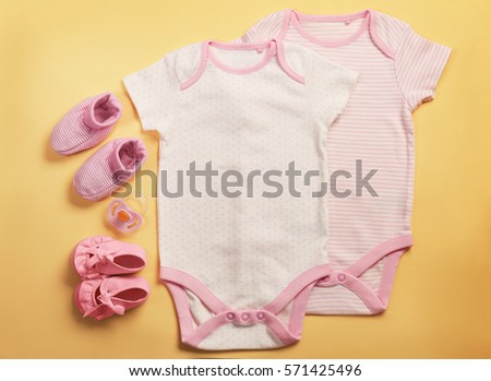 Baby Clothes Stock Images, Royalty-Free Images & Vectors | Shutterstock