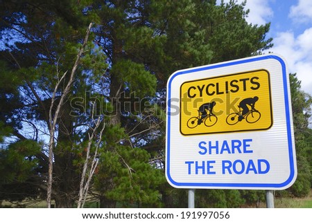stock-photo-cyclist-share-the-road-sign-