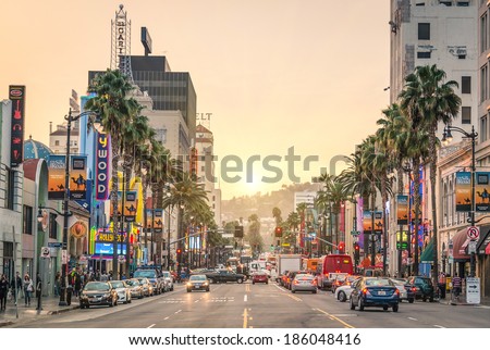 LOS ANGELES - DECEMBER 18, 2013: View of Hollywood Boulevard at sunset. In 1958, the Hollywood Walk of Fame was created on this street as a tribute to artists working in the entertainment industry.