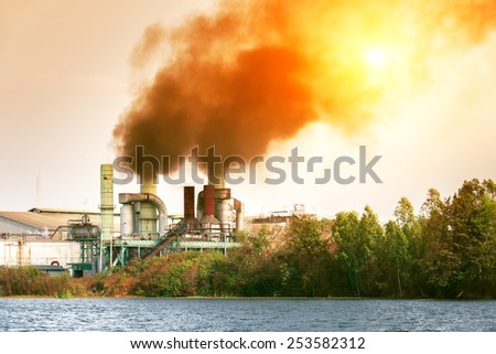 Air pollution by smoke coming out of factory