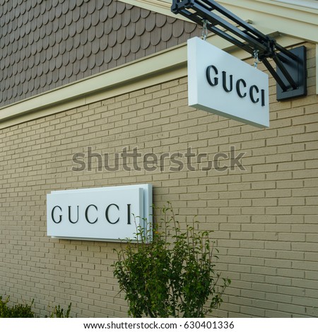 WOODBURY, NEW YORK - OCT 26 : Gucci signboard at Woodbury Common Premium Outlet on Oct 26, 2016 in Woodbury, New York, USA.