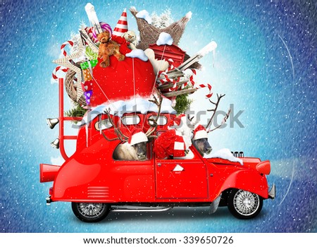 Santa Claus with reindeer in a car with gifts