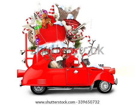 Santa Claus with reindeer in a car with gifts