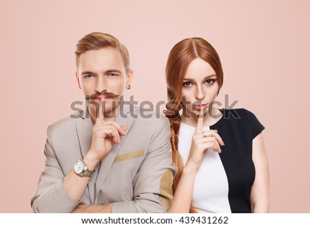http://thumb9.shutterstock.com/display_pic_with_logo/156673/439431262/stock-photo-woman-and-man-keep-secret-couple-shows-hush-sign-adultery-relationship-issue-marriage-cheating-439431262.jpg
