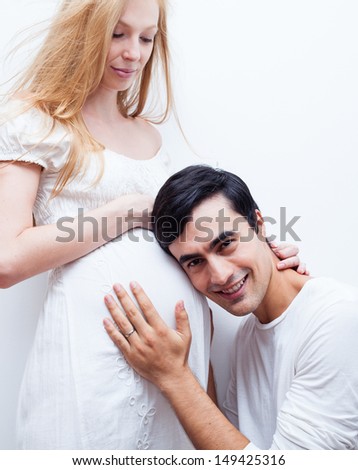 https://thumb9.shutterstock.com/display_pic_with_logo/1603781/149425316/stock-photo-happy-future-dad-listening-the-belly-of-his-pregnant-wife-149425316.jpg
