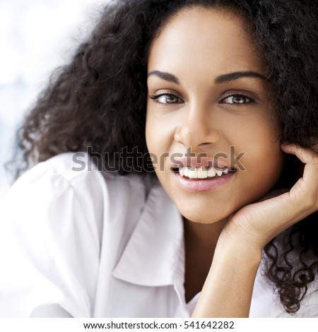 https://thumb9.shutterstock.com/display_pic_with_logo/1615823/541642282/stock-photo-portrait-of-a-beautiful-smiling-african-woman-541642282.jpg